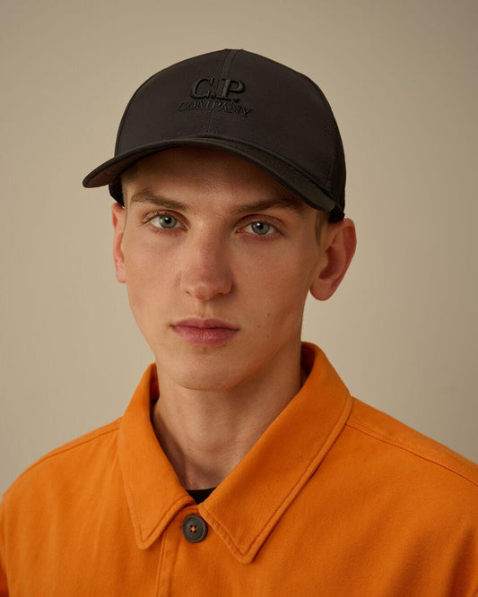 Cappello C.P. Company in nylon con lenti