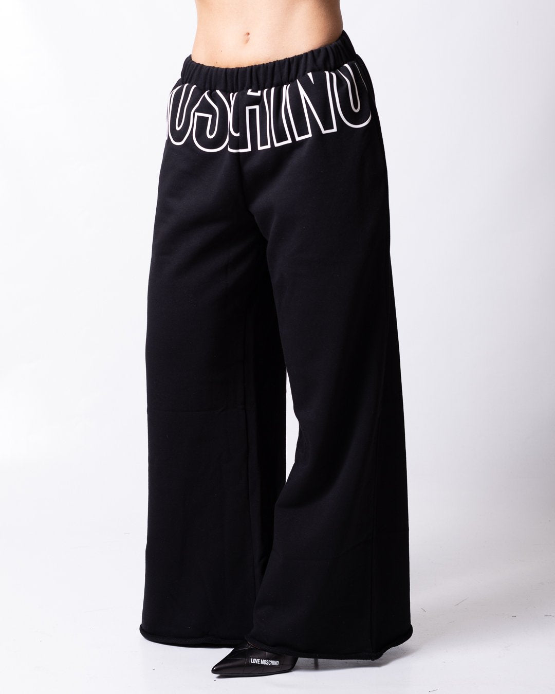 Pantalone Moschino Active con grafica logo in rilievo a contrasto