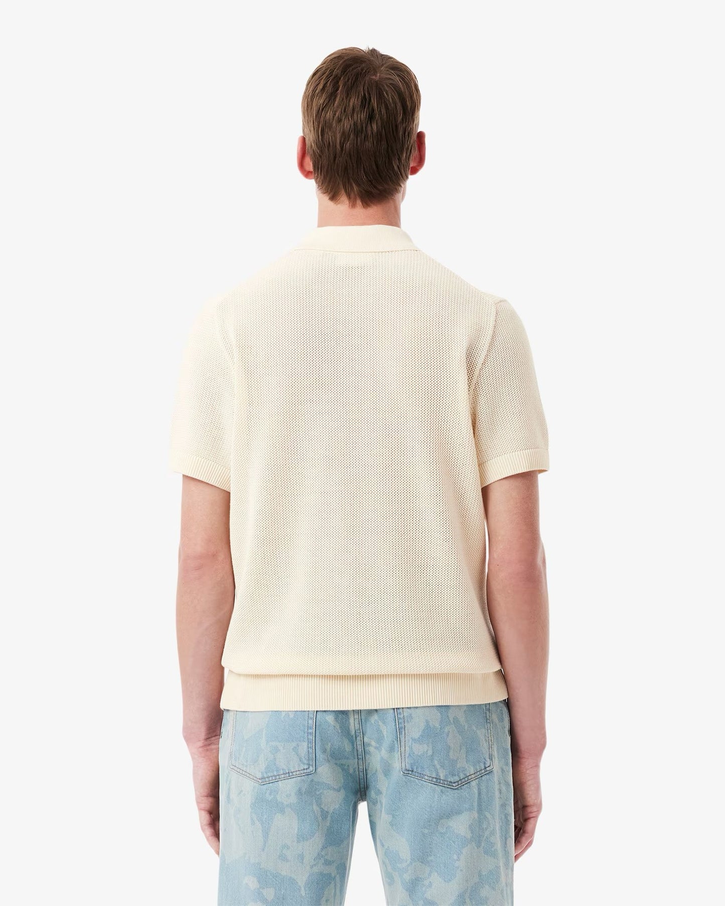 Polo Lacoste in maglia con logo ricamato
