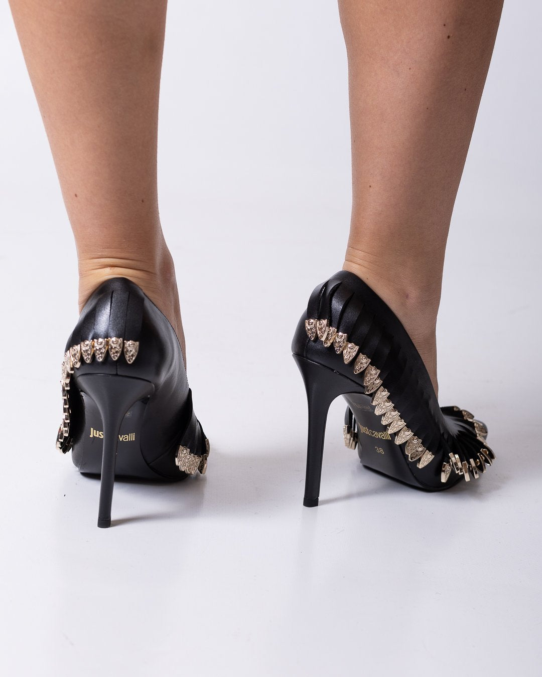 Tacchi Just Cavalli in pelle con frange e dettagli metallici oro