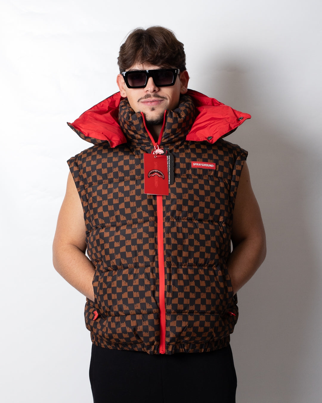 Giubbotto Sprayground puffer con cappuccio e maniche staccabili