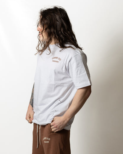 T-Shirt Comme des Fuckdown logata con tagli uomo