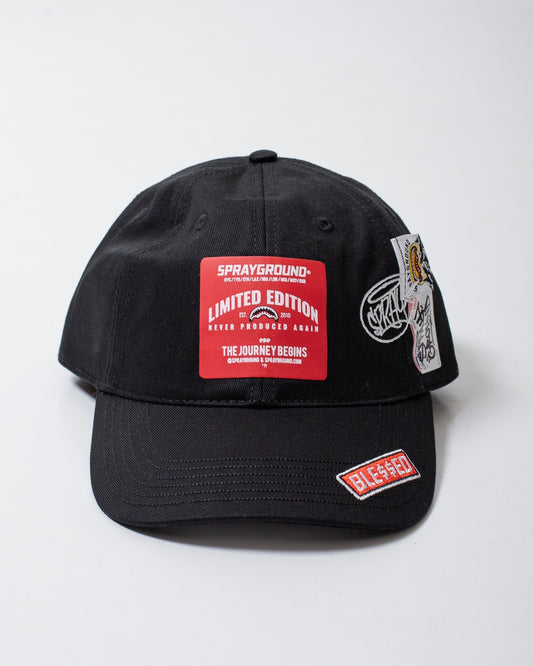 Cappello Sprayground con visiera ed etichette