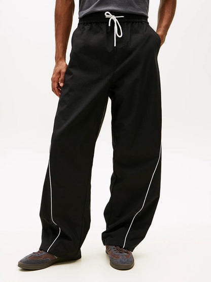 Pantalone Tommy Jeans in nylon "Parachute Track" uomo