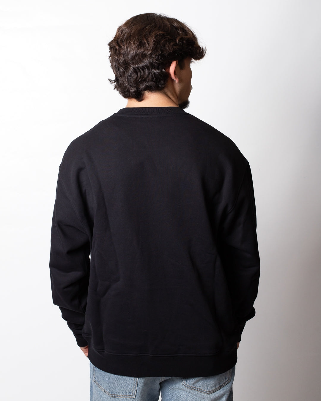 Felpa Moschino girocollo con taschino logato