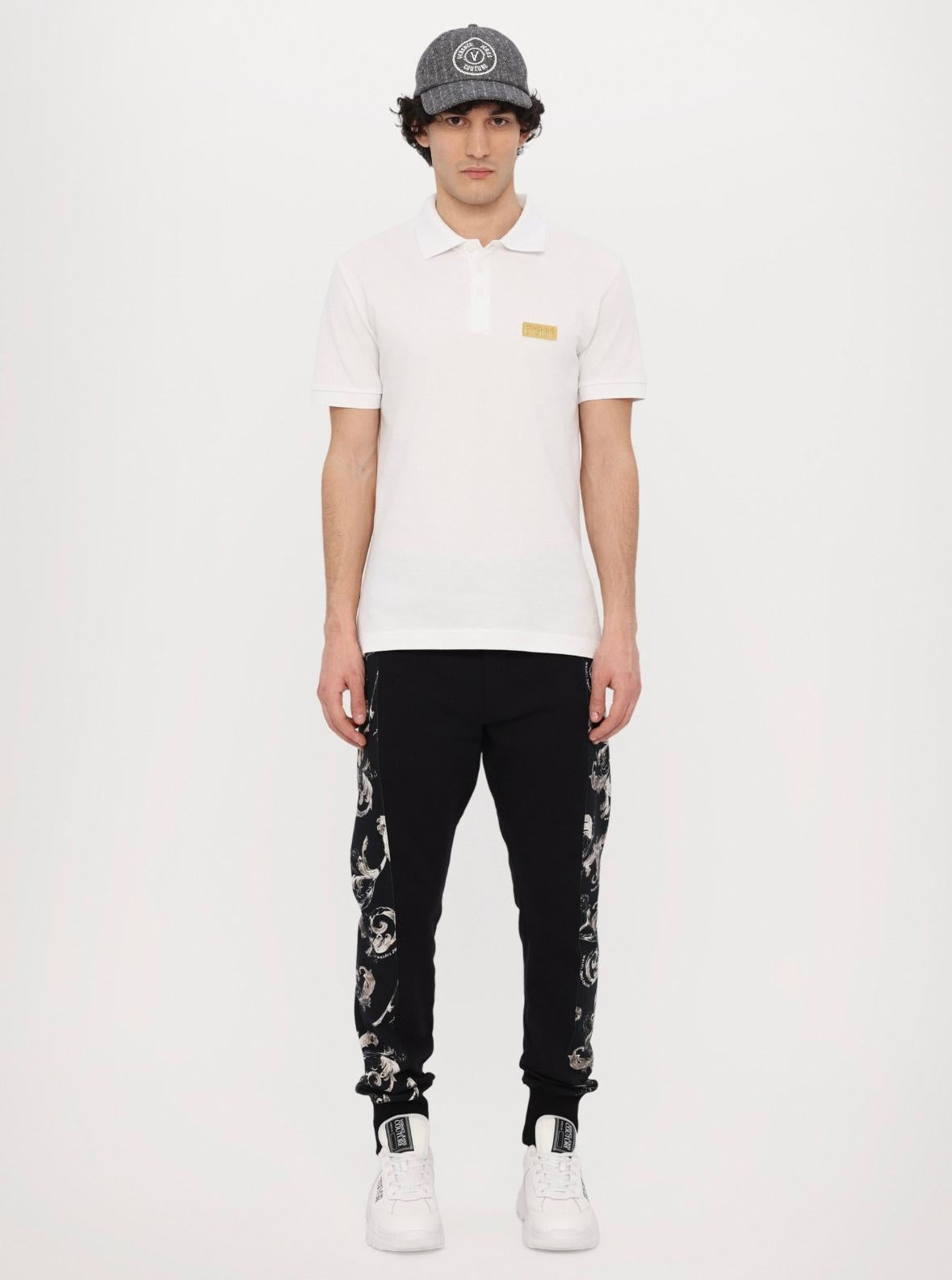 Polo Versace Jeans Couture in pique con logo in metallo uomo