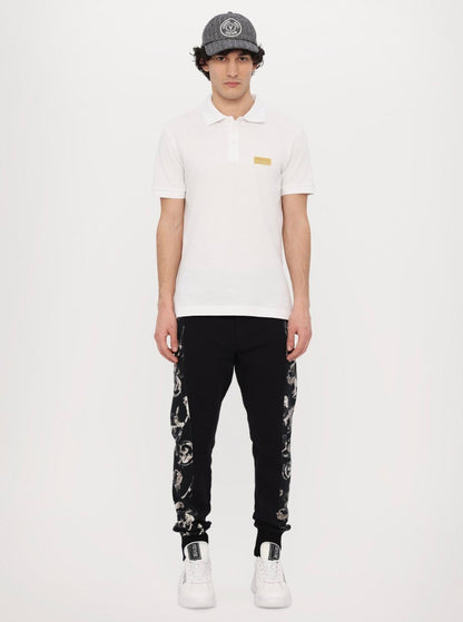 Polo Versace Jeans Couture in pique con logo in metallo uomo