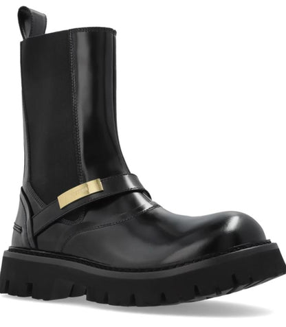 Stivali Moschino slip-on in pelle con placchetta logata uomo