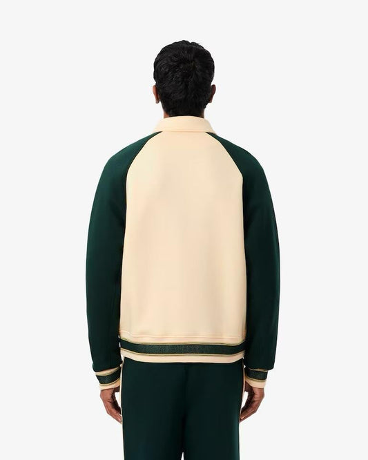 Felpa polo Lacoste con patch logo e color block