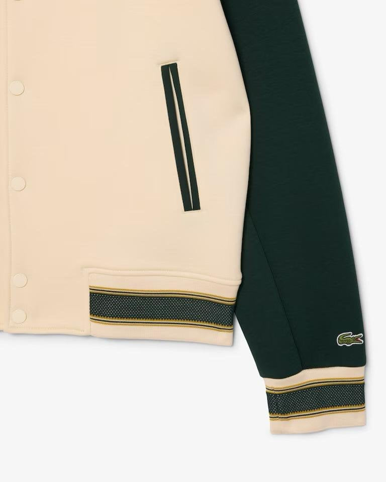 Felpa polo Lacoste con patch logo e color block