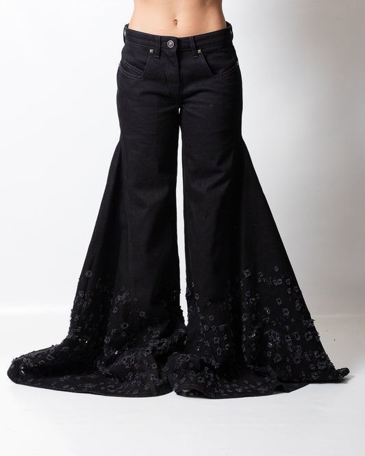 Jeans John Richmond a gamba larga con strappi e logo patch donna