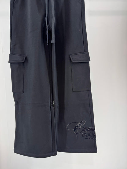 Pantalone Comme des Fuckdown cargo in felpa con stampa in rilievo donna