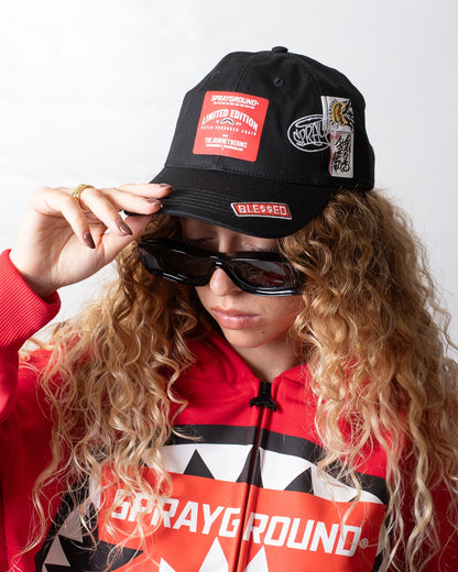 Cappello Sprayground con visiera ed etichette