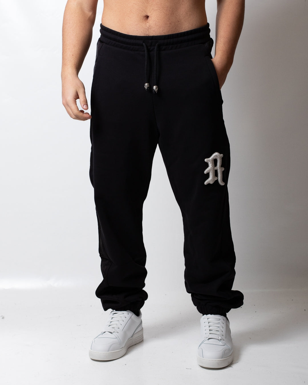 Pantalone John Richmond in felpa con ricamo e dettagli jacquard uomo