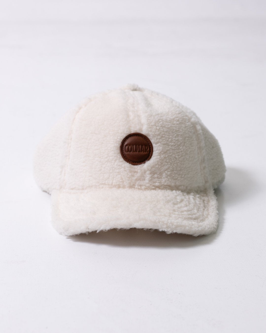 Cappello Colmar con visiera e logo in rilievo