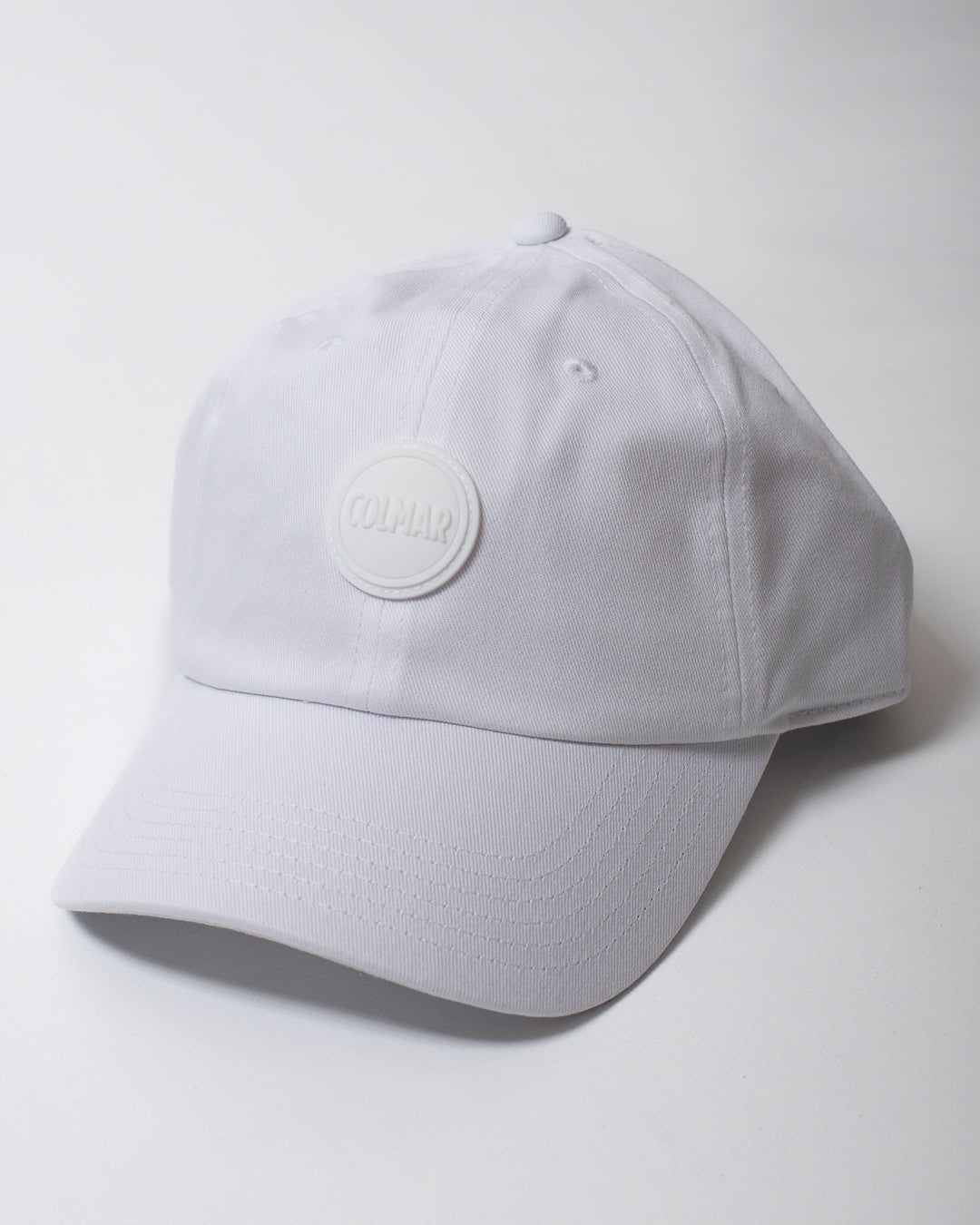 Cappello Colmar con visiera e logo in gomma