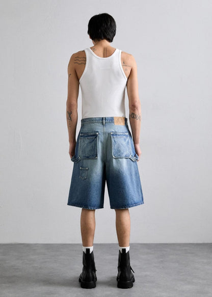 Bermuda Moschino in denim blu con tasconi e dettagli uomo