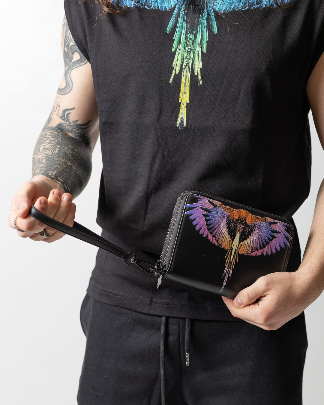Pochette Marcelo Burlon in ecopelle "Icon Wings Orange" logato