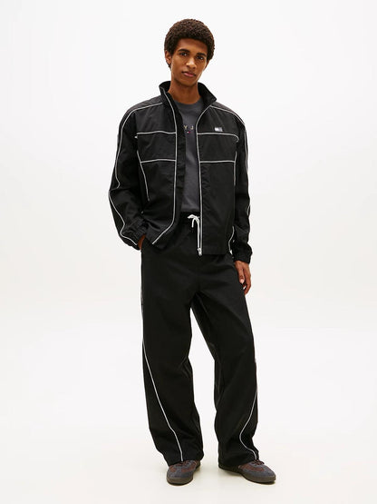 Pantalone Tommy Jeans in nylon "Parachute Track" uomo