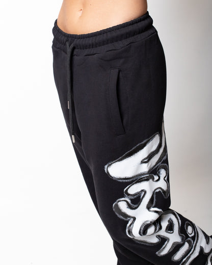 Pantalone Disclaimer in felpa con logo glitterato donna
