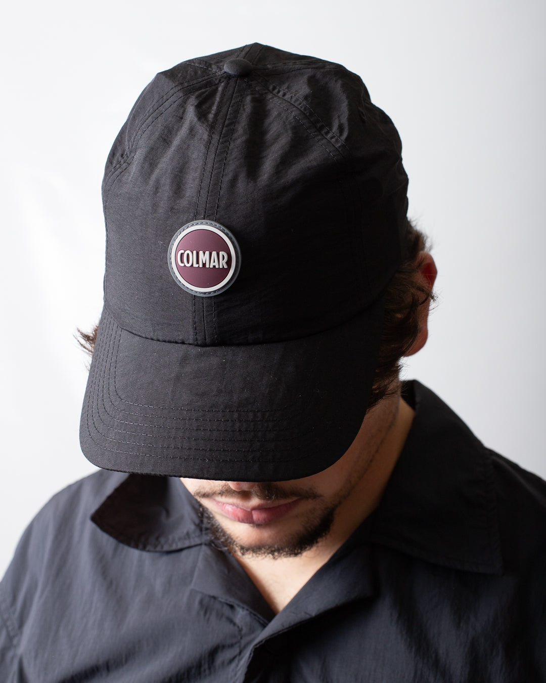 Cappello Colmar con visiera e logo basic in gomma