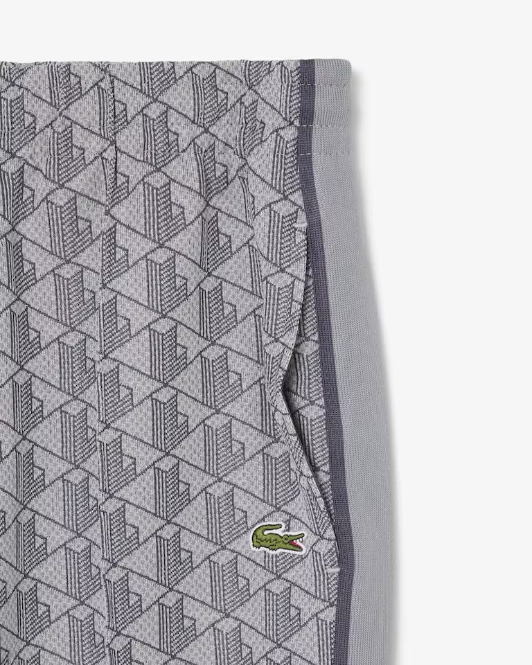 Pantalone Lacoste logato allover uomo