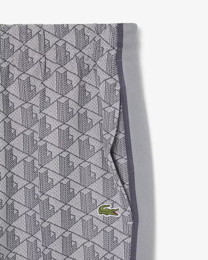Pantalone Lacoste logato allover uomo