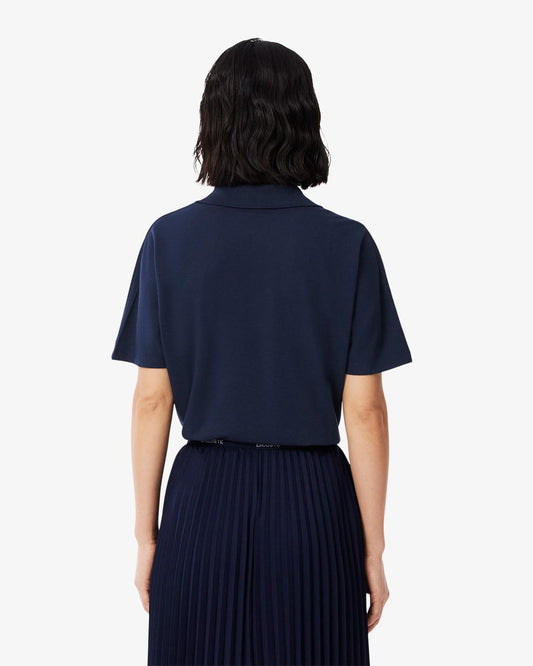 Polo Lacoste in fluido pique donna