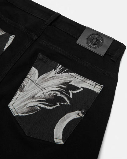Pantalone Versace Jeans Couture narrow fit con piega e fantasia iconica uomo