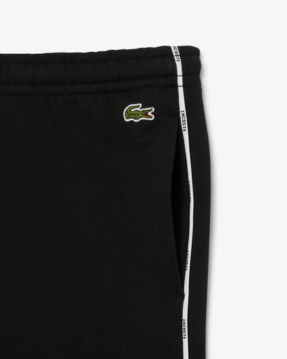 Pantalone Lacoste con logo firmato lungo la gamba uomo