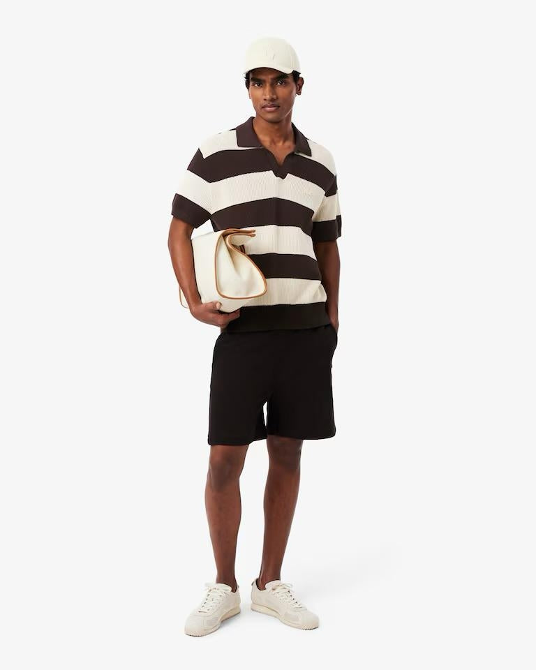 Polo Lacoste in maglia traforata uomo