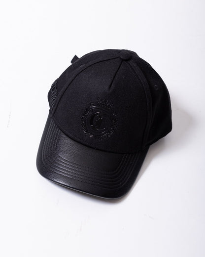 Cappello Just Cavalli in lana ed ecopelle con visiera e logo in rilievo