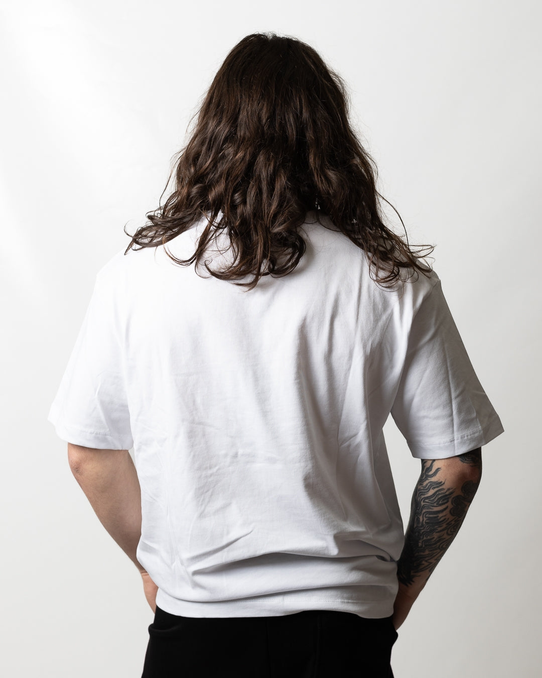 T-Shirt Comme des Fuckdown con taglio e stampa uomo
