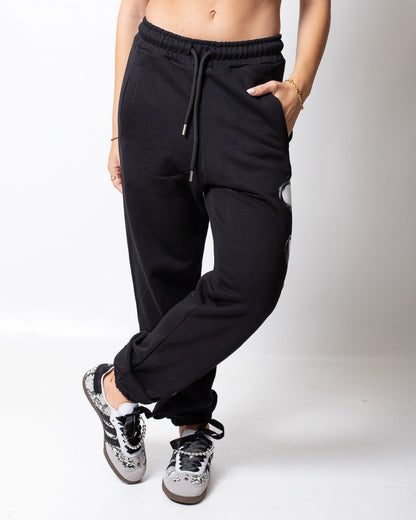 Pantalone Disclaimer in felpa con logo glitterato donna