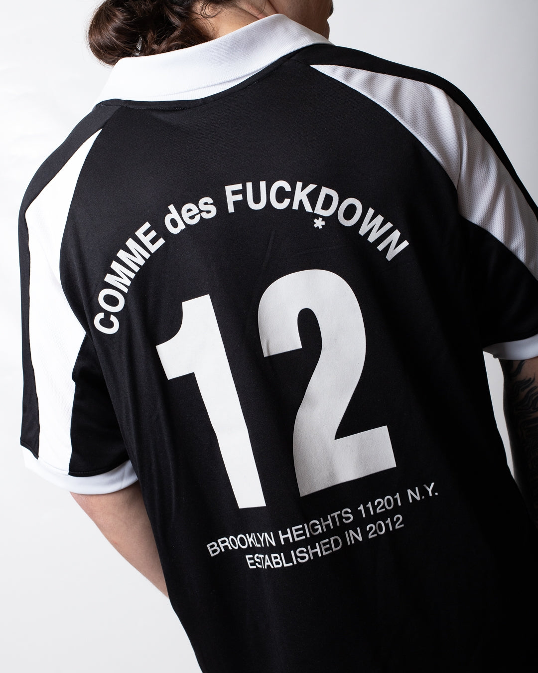 T-Shirt Comme des Fuckdown in poliestere con stampe uomo