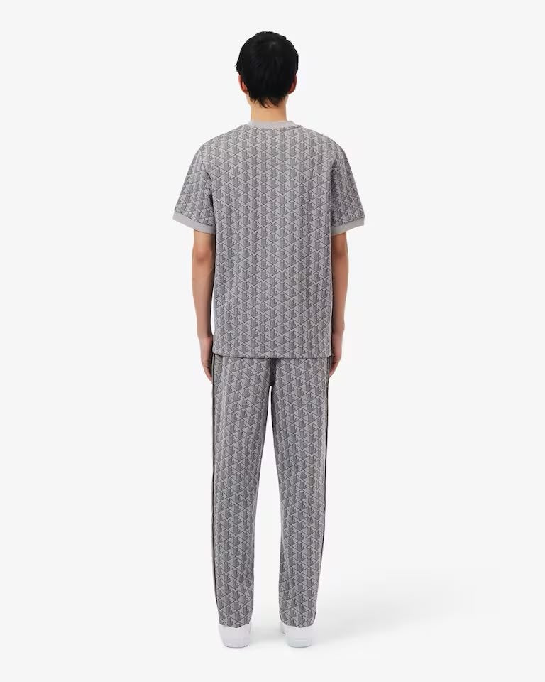 Pantalone Lacoste logato allover uomo
