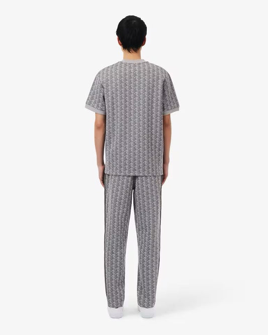Pantalone Lacoste logato allover uomo