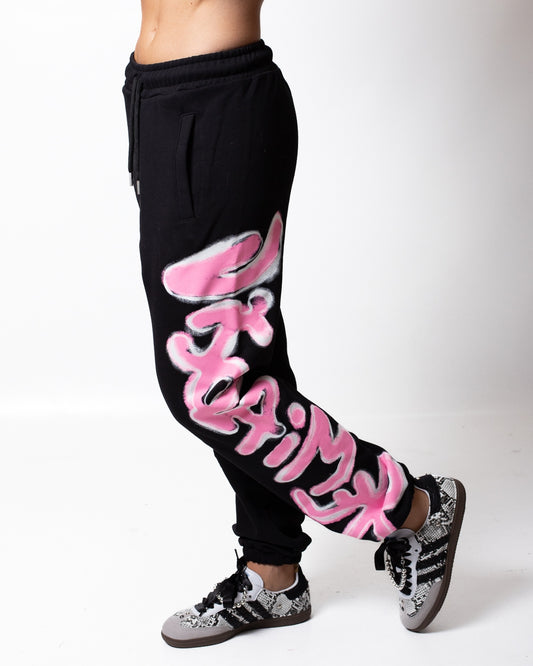 Pantalone Disclaimer in felpa con logo glitterato donna
