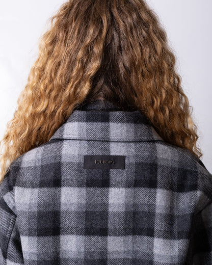 Giubbotto Iceberg in lana motivo tartan con frange e logo in metallo