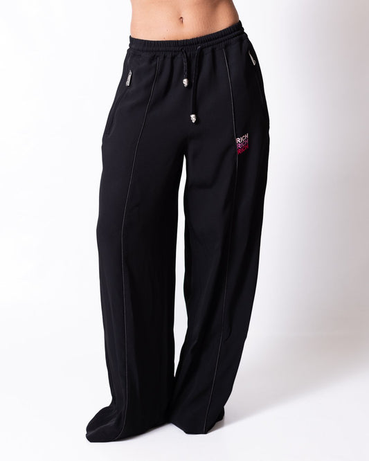 Pantalone John Richmond con logo in velluto applicato