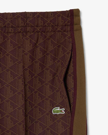 Pantalone Lacoste logato allover uomo