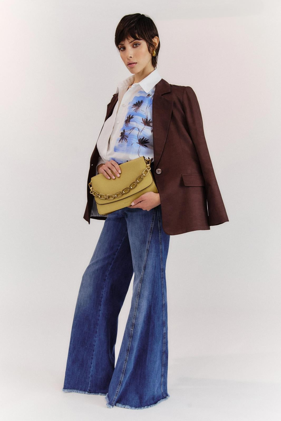 Jeans Nenette a zampa con occhielli donna
