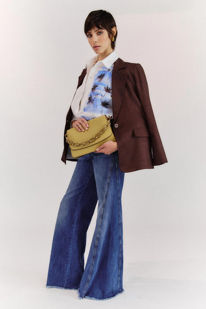 Jeans Nenette a zampa con occhielli donna