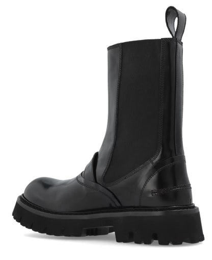 Stivali Moschino slip-on in pelle con placchetta logata uomo