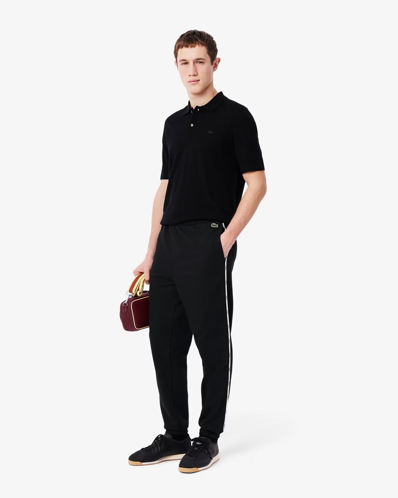 Pantalone Lacoste con logo firmato lungo la gamba uomo
