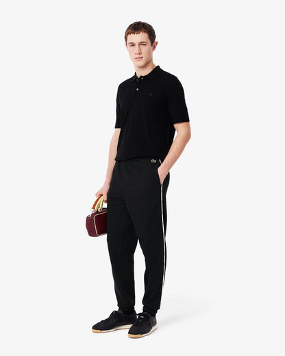 Pantalone Lacoste con logo firmato lungo la gamba uomo