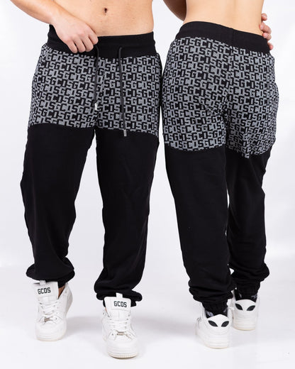 Pantalone GCDS con logo allover a contrasto 