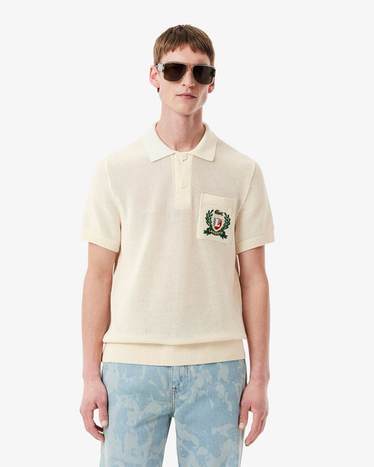 Polo Lacoste in maglia con logo ricamato