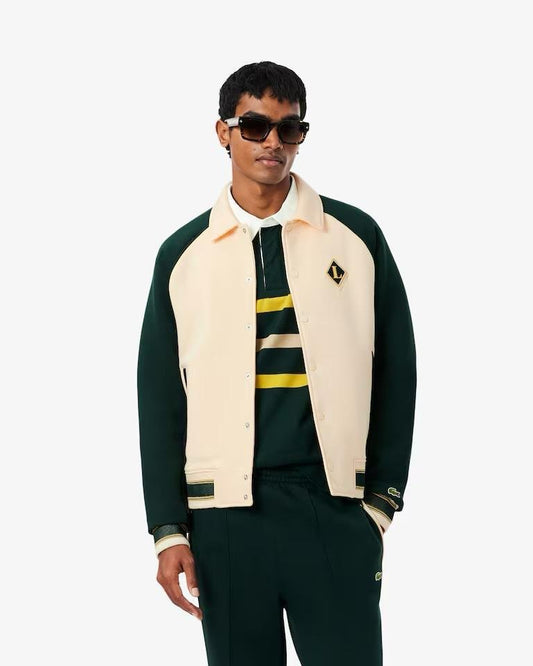 Felpa polo Lacoste con patch logo e color block