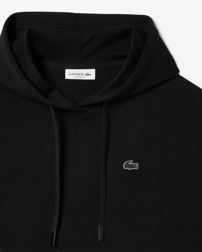 Felpa Lacoste cropped con cappuccio e logo in silicone donna